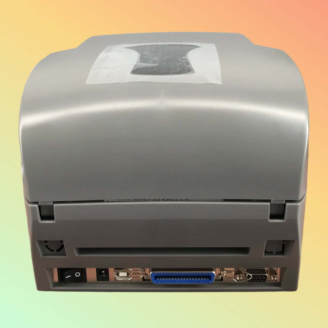 Godex EZ-1100Plus printer connected to a laptop, ready for label printing
