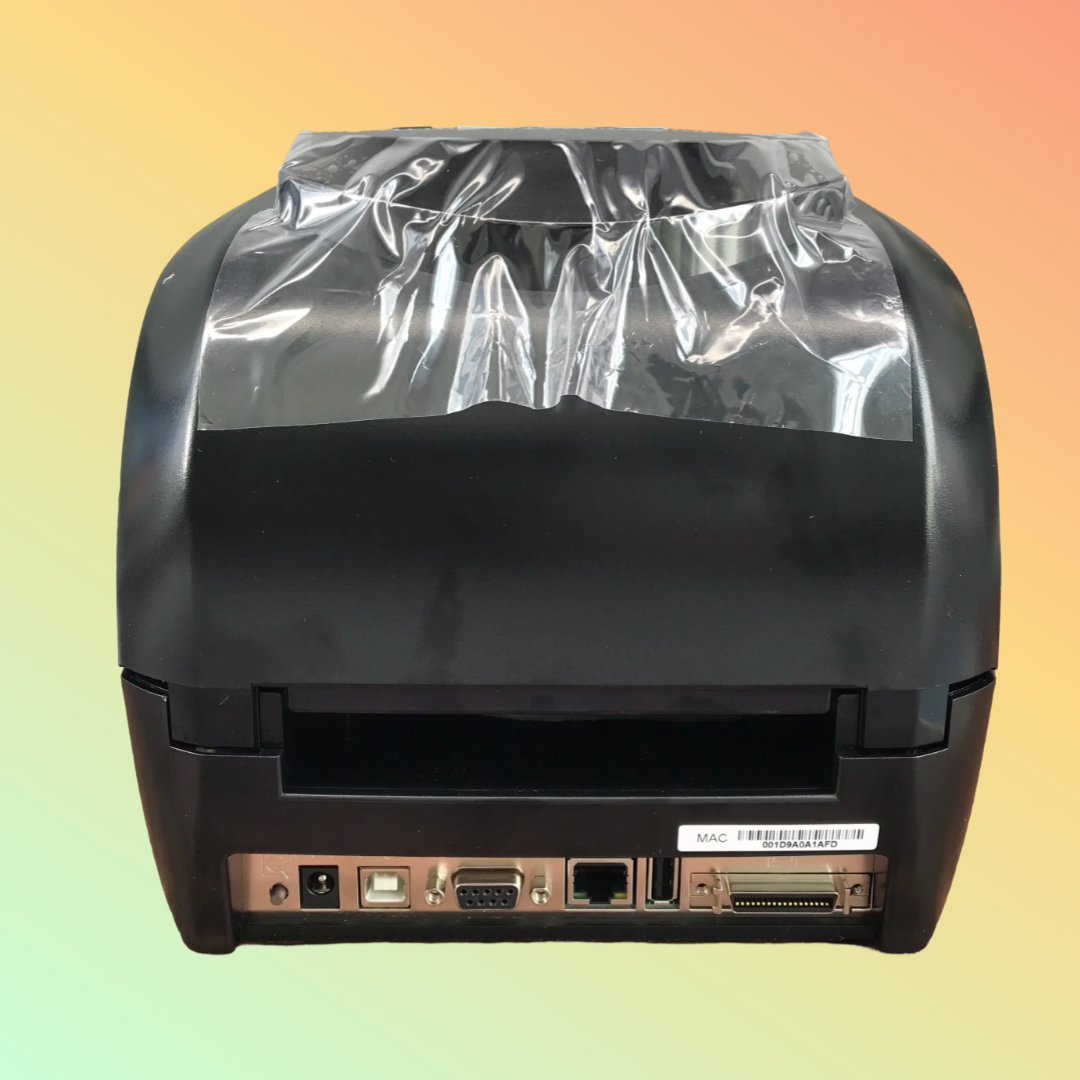 Godex RT863i thermal transfer printer displaying printed barcode labels
